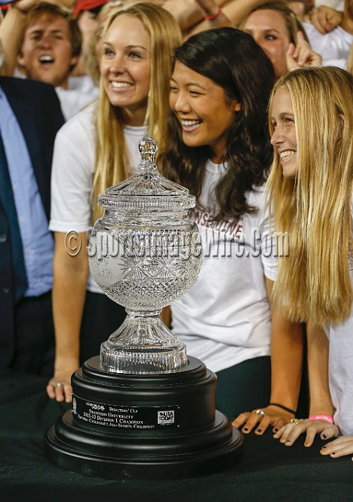 2013-Stanford-Oregon-039.JPG - Nov. 7, 2013; Stanford, CA, USA; Stanford Cardinal athletes      surround the Learfield Sports Directors Cup, won for the nineteenth straight year, during halftime against the Oregon Ducks at Stanford Stadium. Stanford defeated Oregon 26-20.