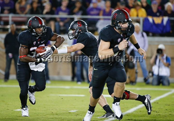 2013Stanford-Wash-056.JPG - Oct. 5, 2013; Stanford, CA, USA; Stanford Cardinal quarterback Kevin Hogan (center) hands off to running back Anthony Wilkerson (32) as fullback Ryan Hewitt (85) lead blocks against the Washington Huskies at  Stanford Stadium. Stanford defeated Washington 31-28.
