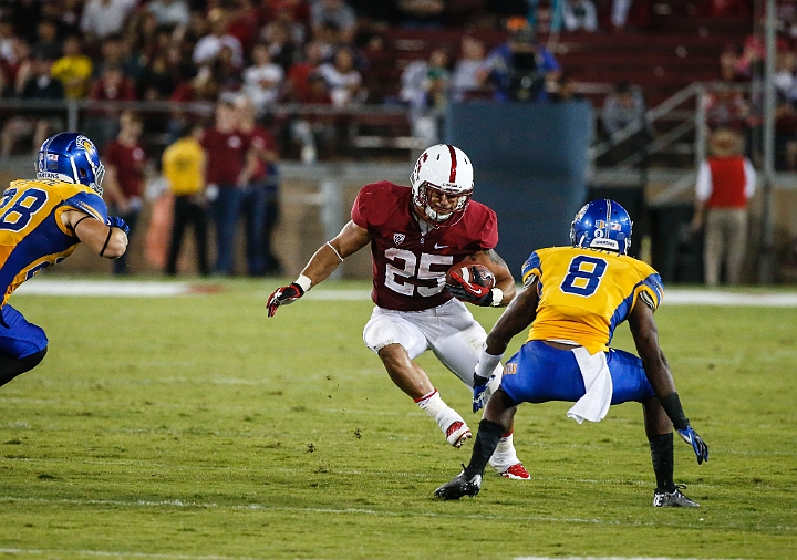 130907-Stanford-SanJose-017.JPG - Sept.7, 2013; Stanford, CA, USA; Stanford Cardinal running back Tyler Gaffney (25) is tackled by San Jose State Spartans corner back Jimmy Pruitt (8) at  Stanford Stadium. Stanford defeated San Jose State 34-13.