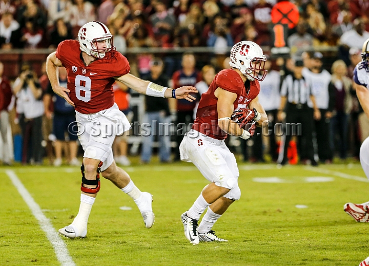 2015StanWash-033.JPG - Oct 24, 2015; Stanford, CA, USA; Stanford Cardinal quarterback Kevin Hogan (8) hands of to running back Christian McCaffrey (5) in the first quarter against the Washington Huskies at Stanford Stadium. Stanford beat Washington 31-14.