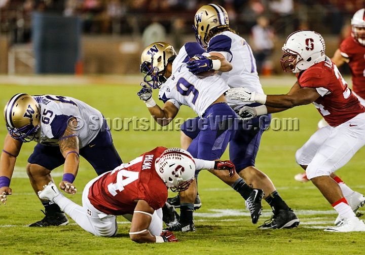 2015StanWash-036.JPG - Oct 24, 2015; Stanford, CA, USA; Washington Huskies tailback Myles Gaskin (9) runs for 5 yards in the first quarter before being tackled by Stanford Cardinal linebacker Peter Kalambayi (34) at Stanford Stadium. Stanford beat Washington 31-14.