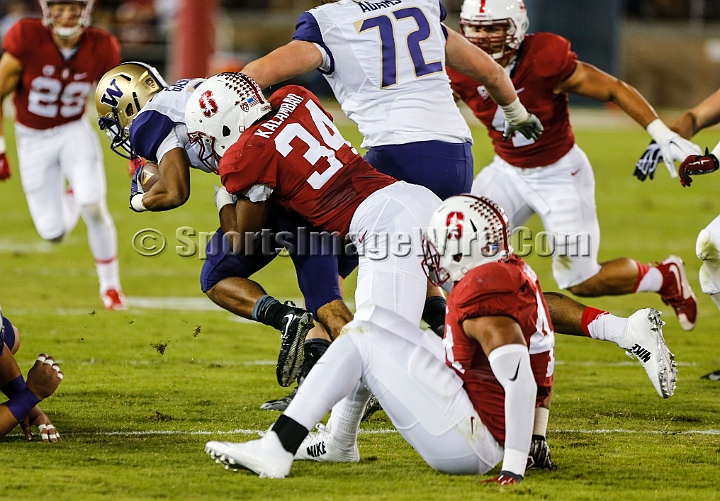 2015StanWash-037.JPG - Oct 24, 2015; Stanford, CA, USA; Washington Huskies tailback Myles Gaskin (9) runs for 5 yards in the first quarter before being tackled by Stanford Cardinal linebacker Peter Kalambayi (34) at Stanford Stadium. Stanford beat Washington 31-14.