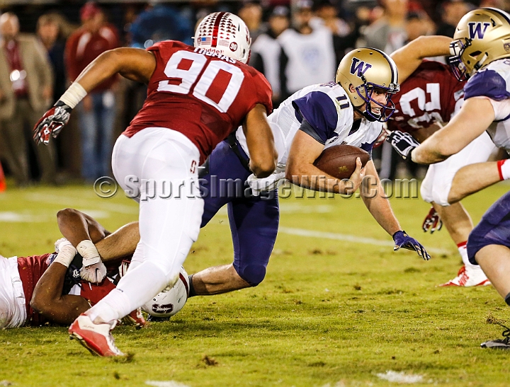 2015StanWash-063.JPG - Oct 24, 2015; Stanford, CA, USA; Washington Huskies quarterback K. J. Carta-Samuels (11) is sacked by Stanford Cardinal linebacker Peter Kalambayi (34) in the third quarter at Stanford Stadium. Stanford beat Washington 31-14.