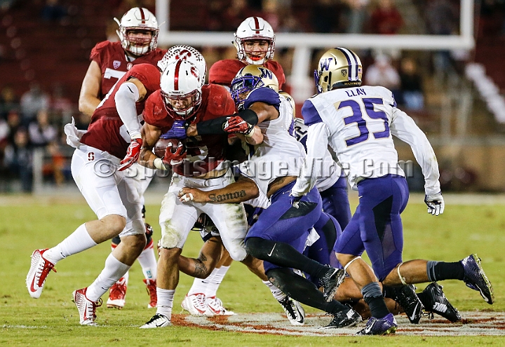 2015StanWash-069.JPG - Oct 24, 2015; Stanford, CA, USA; Stanford Cardinal running back Christian McCaffery is gang tackled following a run in the fourth quarter against the Washington Huskies at Stanford Stadium. Stanford beat Washington 31-14.