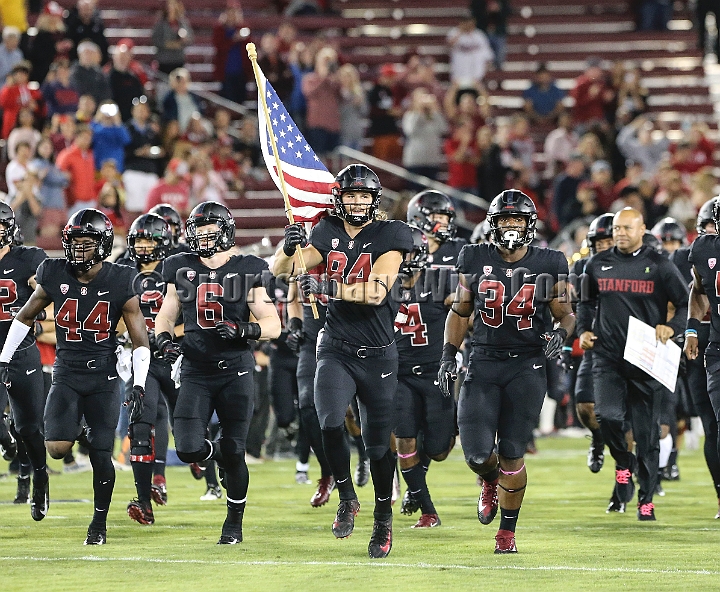 20181006StanfordUtah-007.JPG - Oct. 6, 2018; Stanford, CA.; Stanford tight end Colby Parkinson (84) carries the flag as the Cardinal take the field for an NCAA football game against the Utah Utes at Stanford Stadium. Utah defeated Stanford 40-21. 