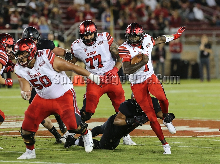 20181006StanfordUtah-011.JPG - Oct. 6, 2018; Stanford, CA.; Utah quarterback Tyler Huntley (1) runs the ball during an NCAA football game between the Stanford Cardinal and the Utah Utes at Stanford Stadium. Utah defeated Stanford 40-21.