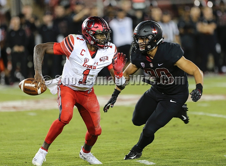 20181006StanfordUtah-033.JPG - Oct. 6, 2018; Stanford, CA.; Utah quarterback Tyler Huntley (1) is sacked by Stanford line backer Gabe Reid (90) during an NCAA football game between the Stanford Cardinal and the Utah Utes at Stanford Stadium. Utah defeated Stanford 40-21. 